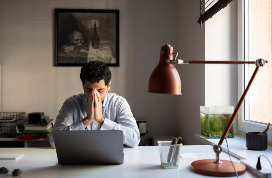Anxious man working front view