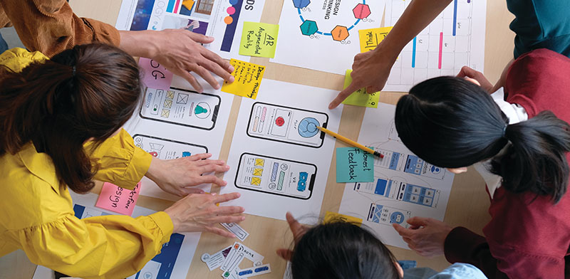 Group of people working strategizing for a brand